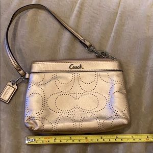 Mini gold coach wristlet